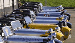 Assembly line-up of Caterhams at Pembrey